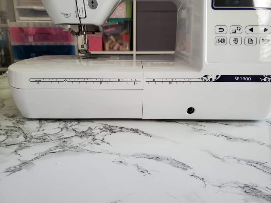 ruler on side of machine