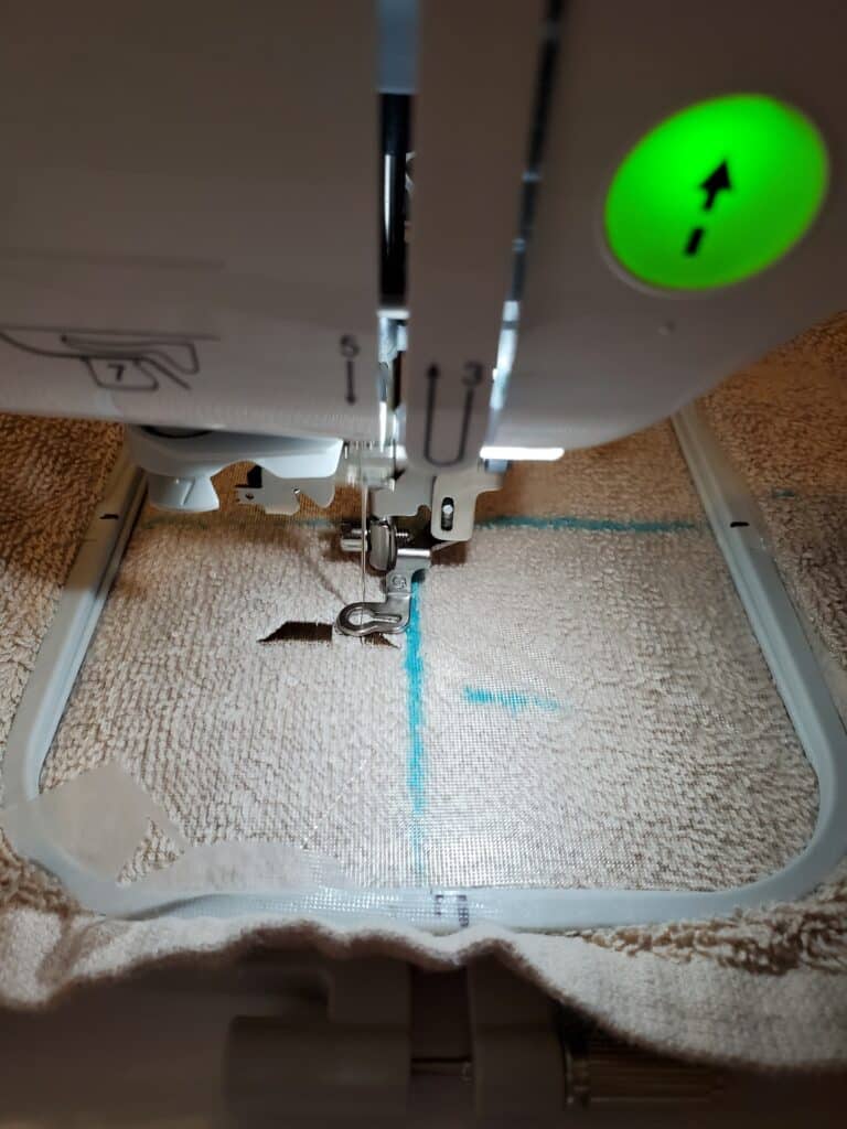 press start and watch the machine embroider