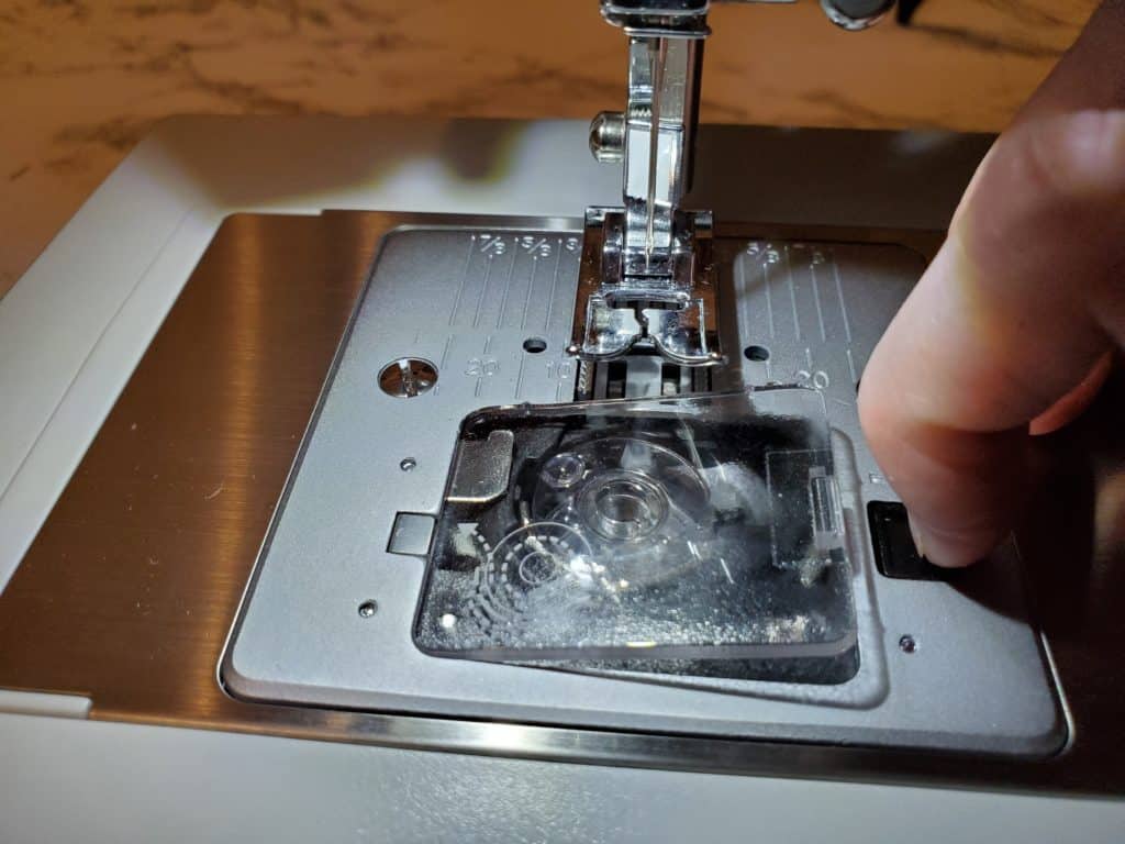 how to remove a singer heavy duty bobbin