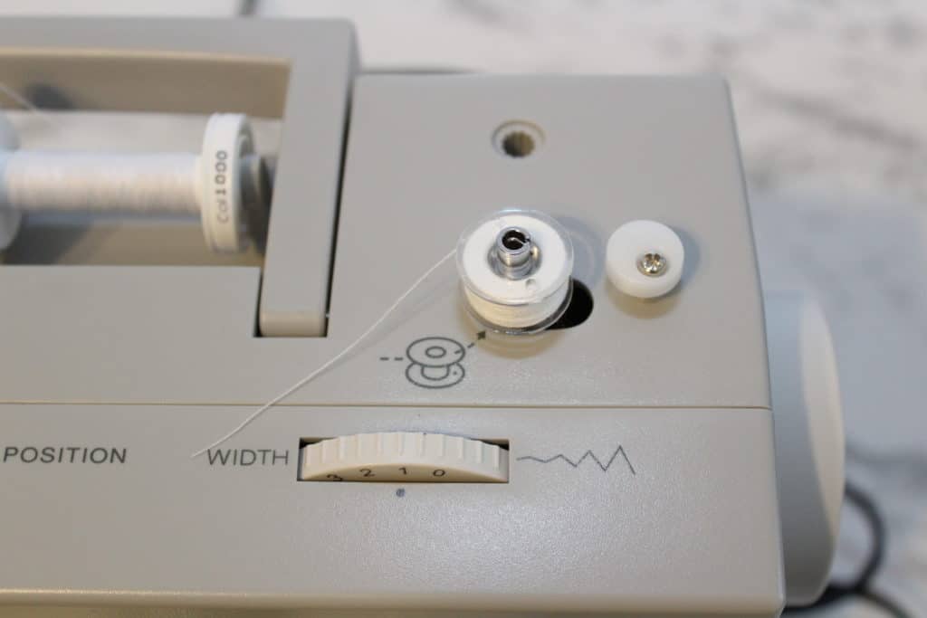 how to wind a bobbin on a heavy duty sewing machine