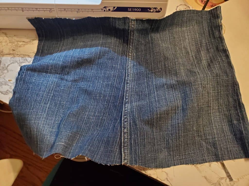 cut along the seam of the jeans