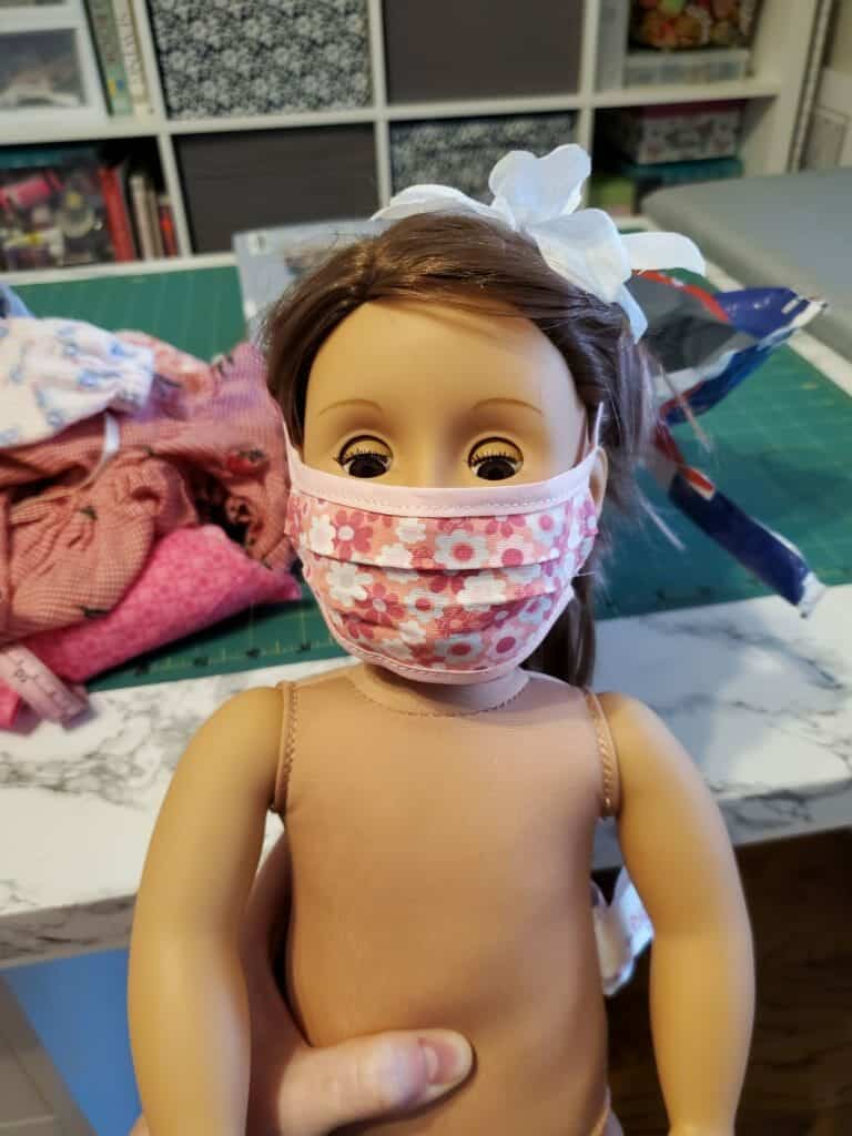 doll wearing her sewn doll face mask