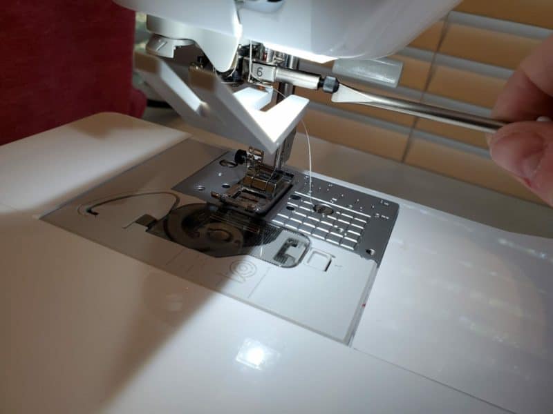 tighten the screw back on the brother sewing machine