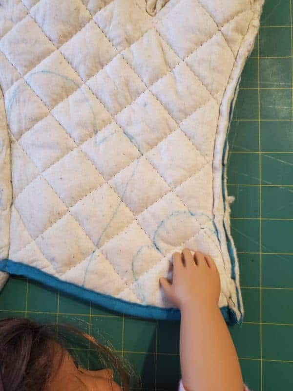 measure the doll's hand for the oven mitt