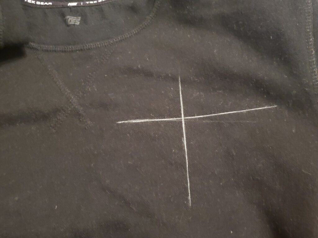 sweatshirt marked with chalk