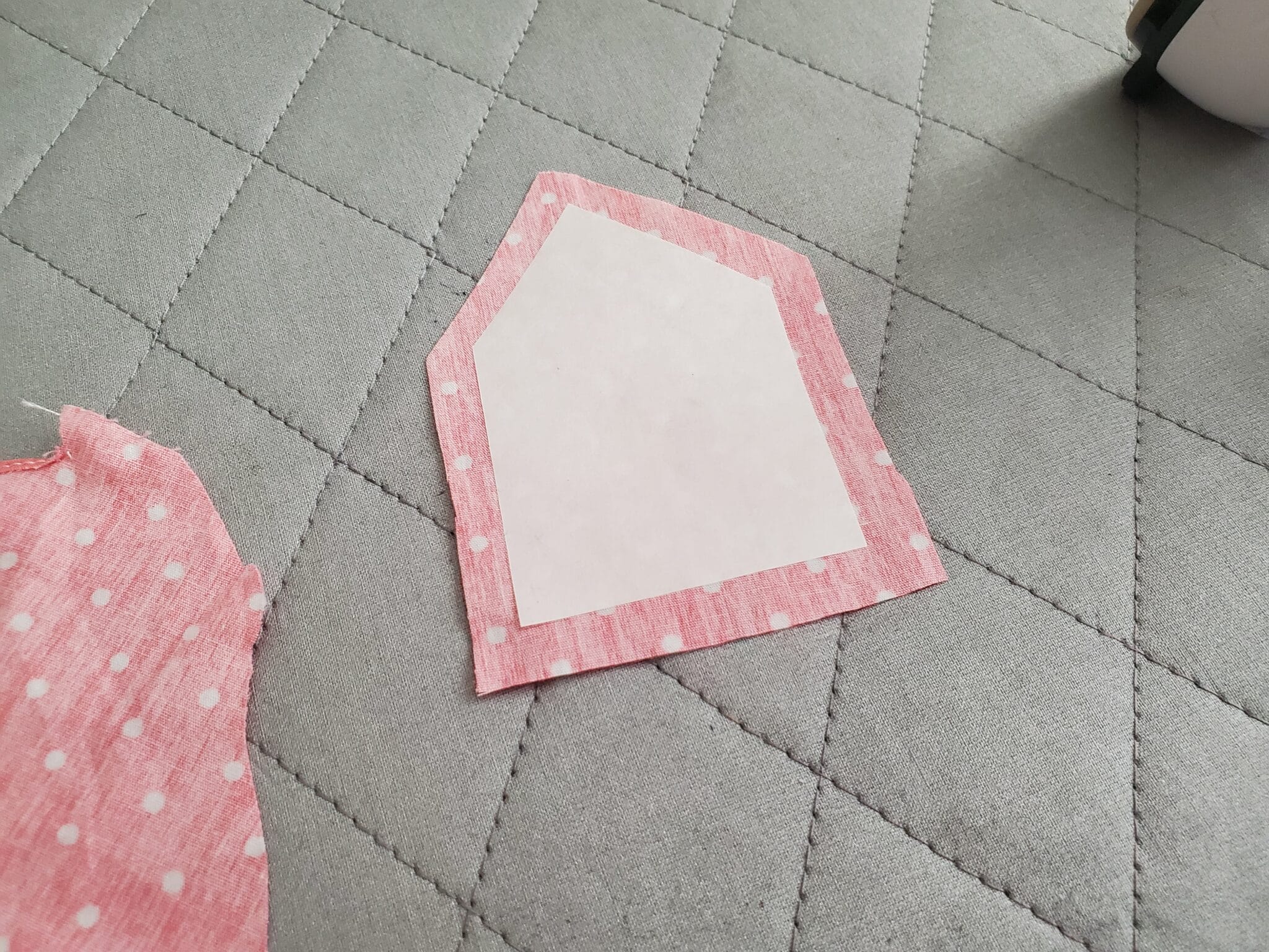 cut a seam allowance around the freezer paper applique