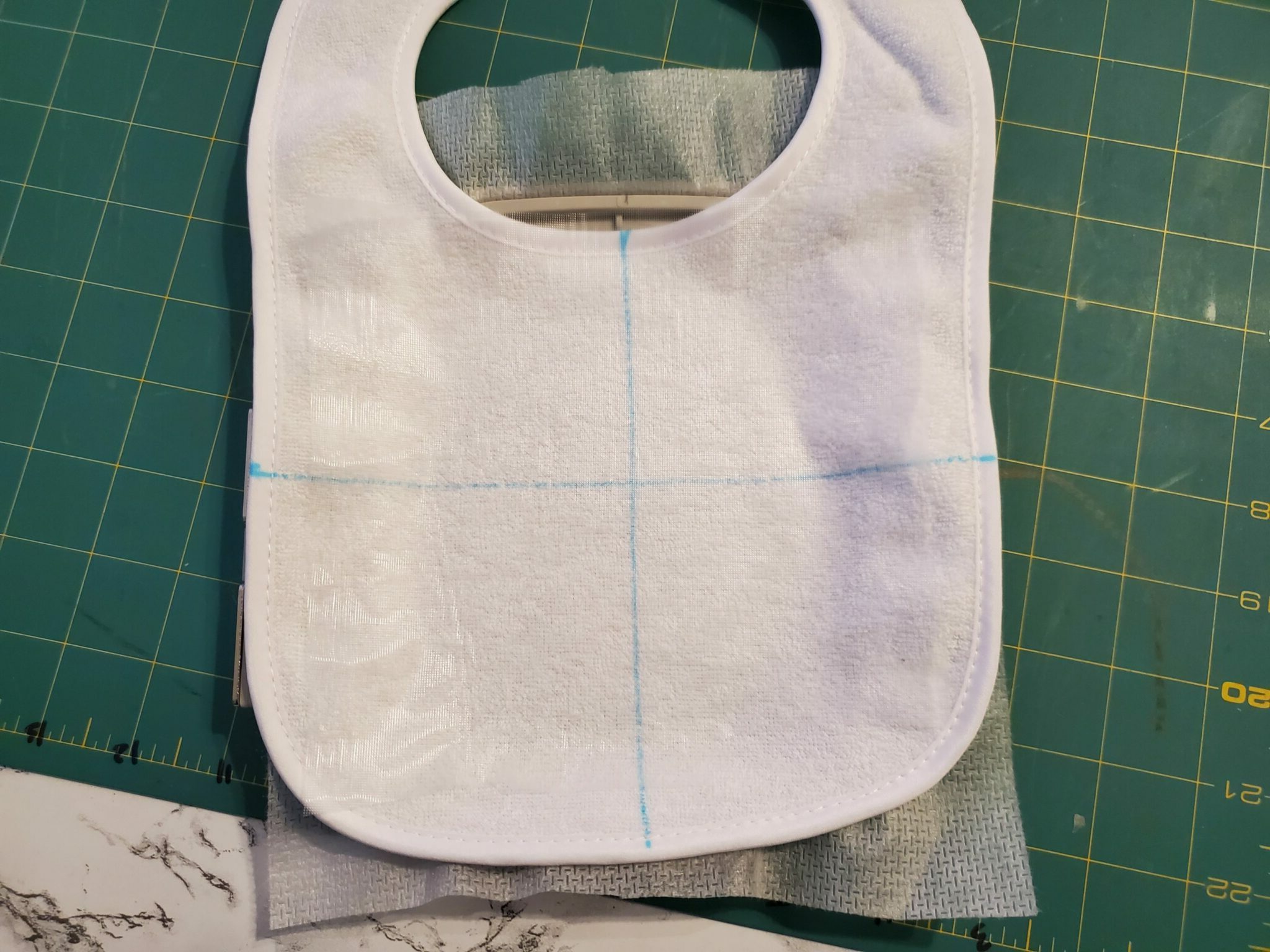 how to hoop a bib for embroidery - float!