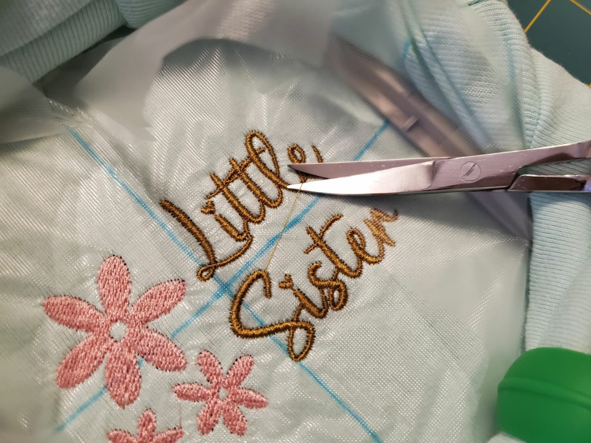 clip jump stitches on onesie