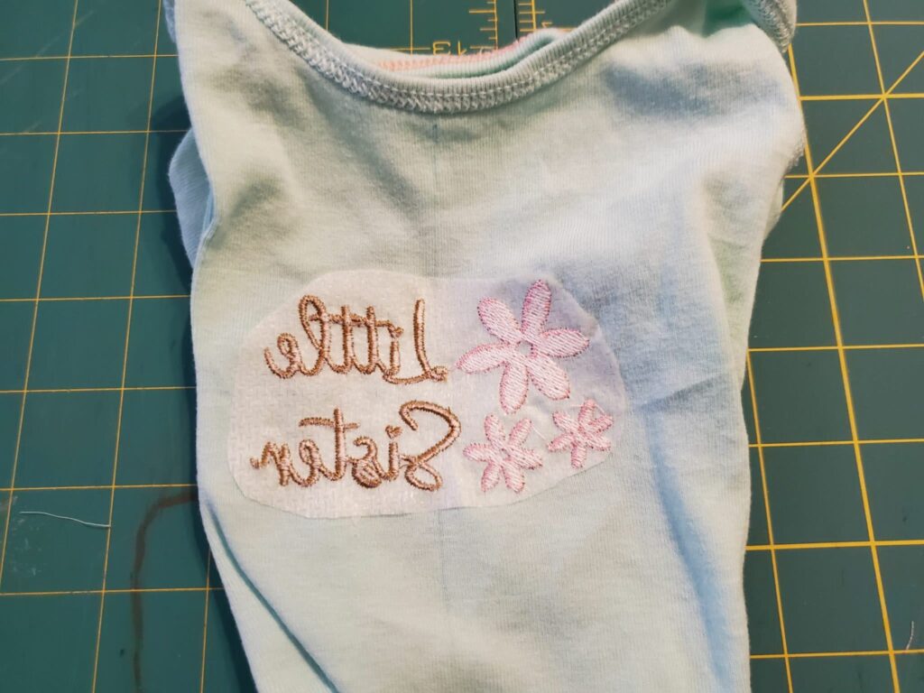 trim stabilizer on back of onesie