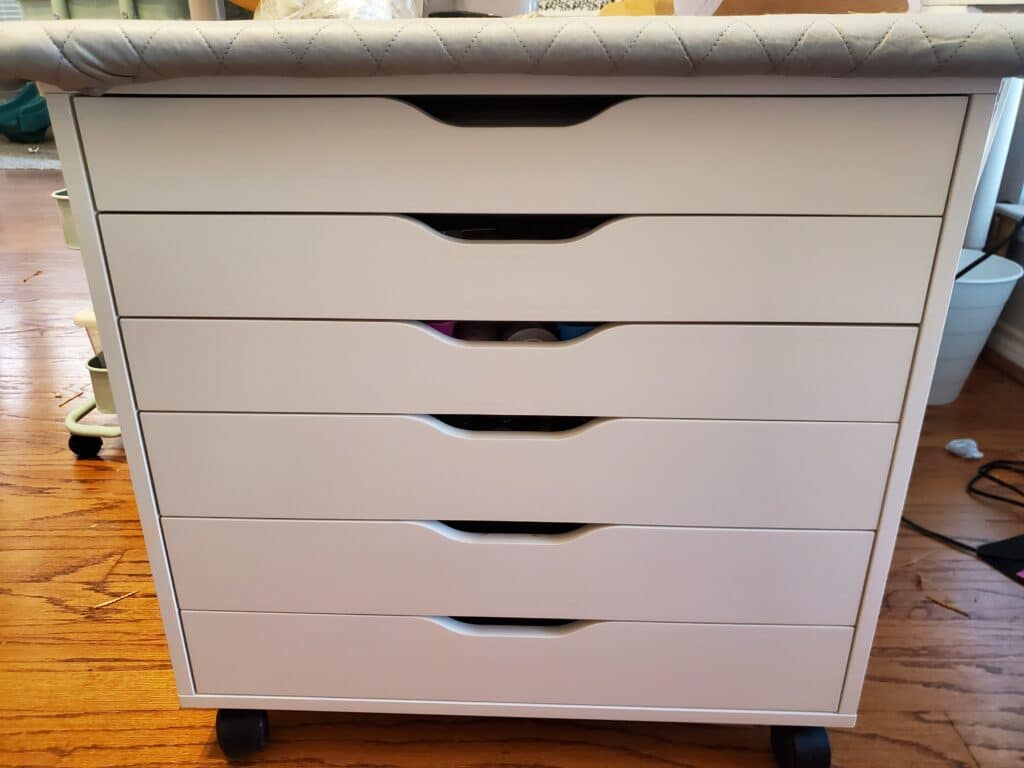 the IKEA Alex drawer with my ironing board on top