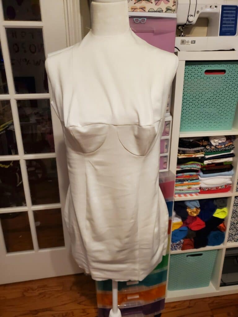 trying the dress form cover on the dress form