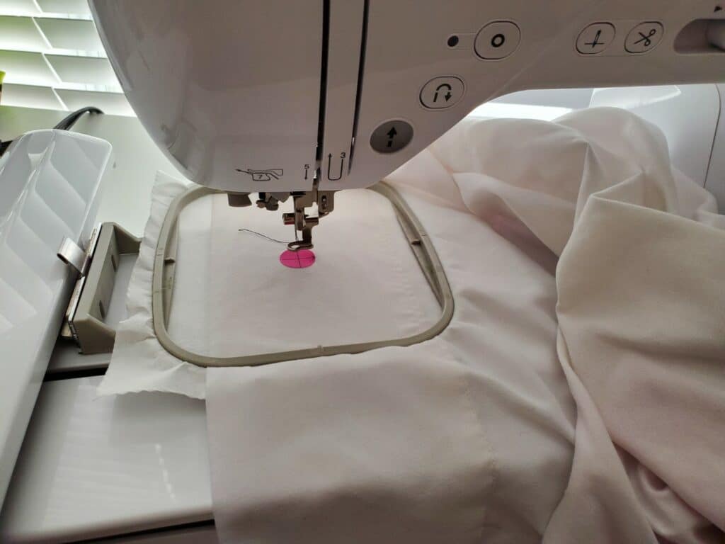 how to use an embroidery placement sticker