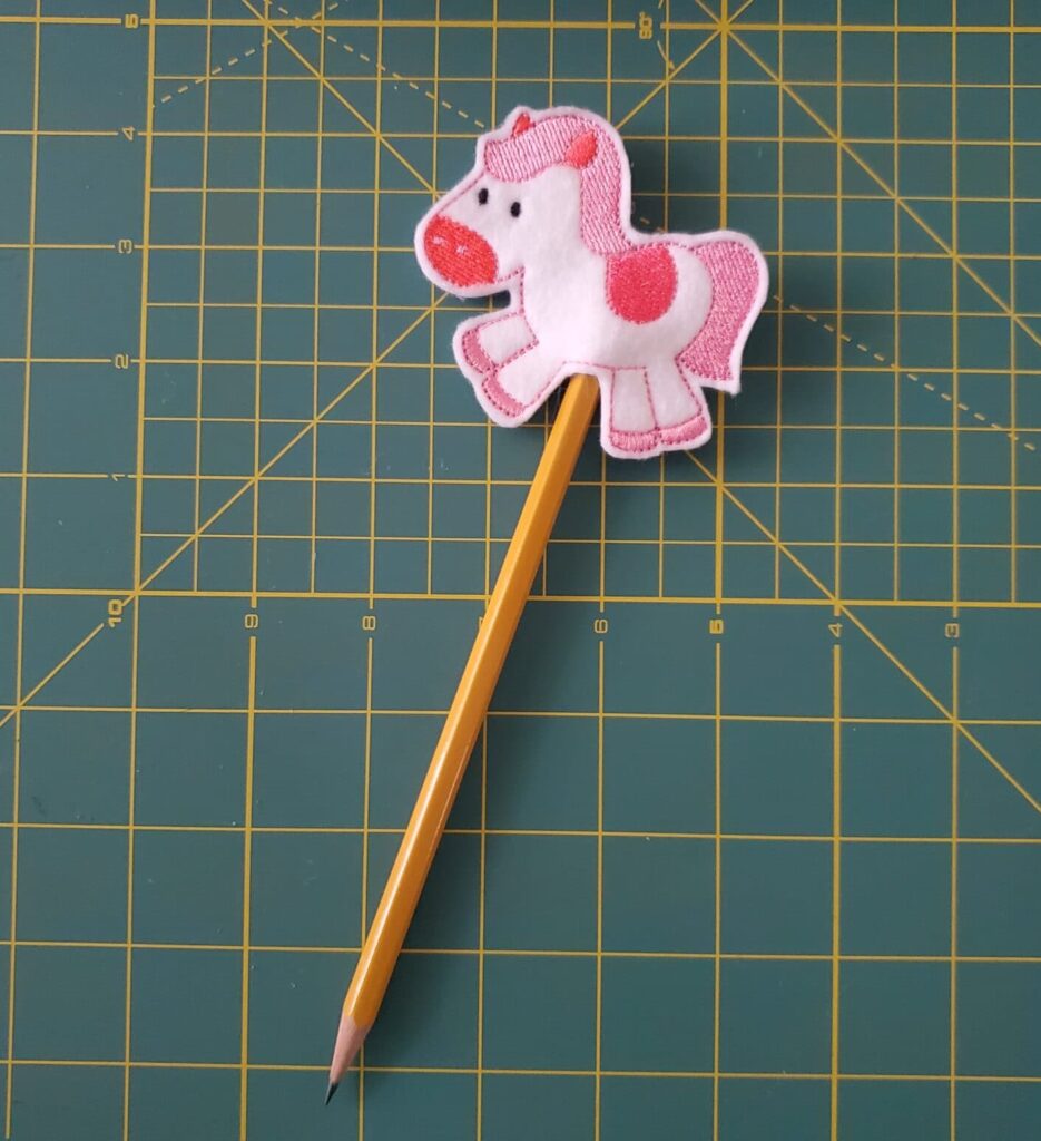 ith pencil topper