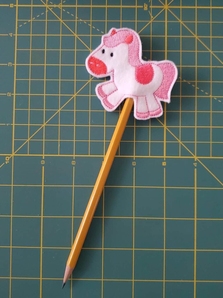 ith pencil topper