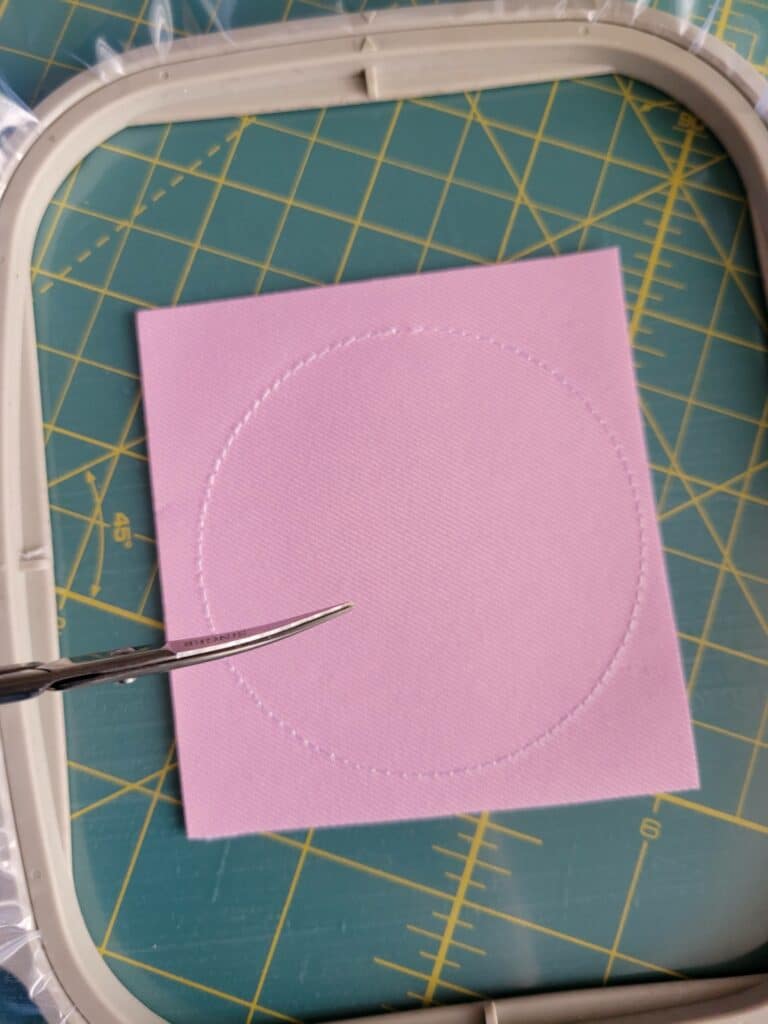 cutting patch fabric to size with scissors