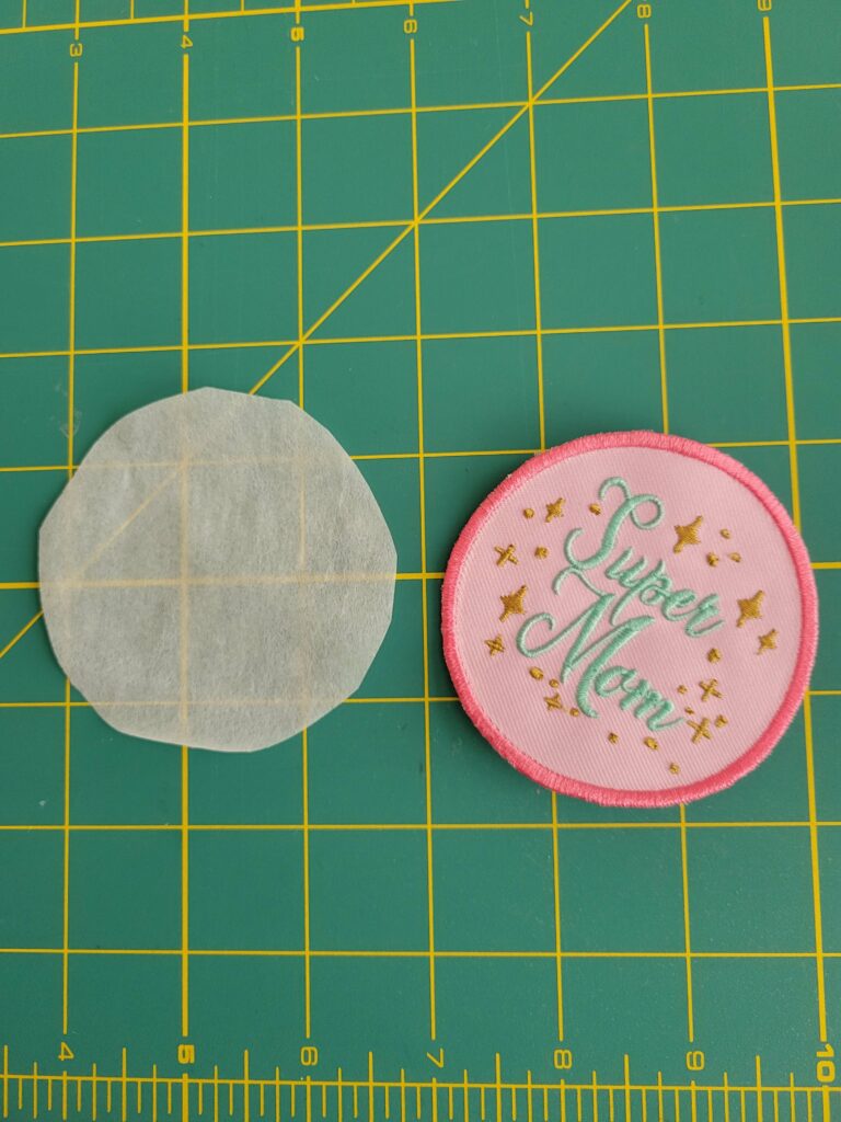 cut fusible web to the size of the patch