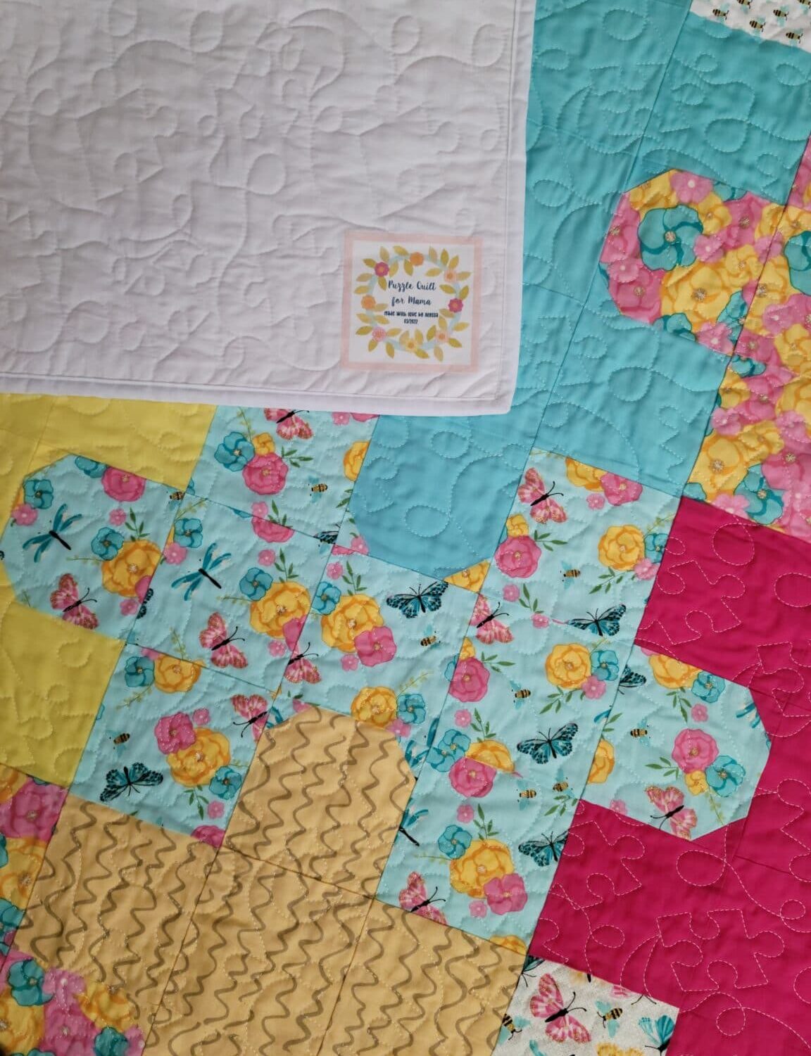 puzzle quilt with label made by cricut